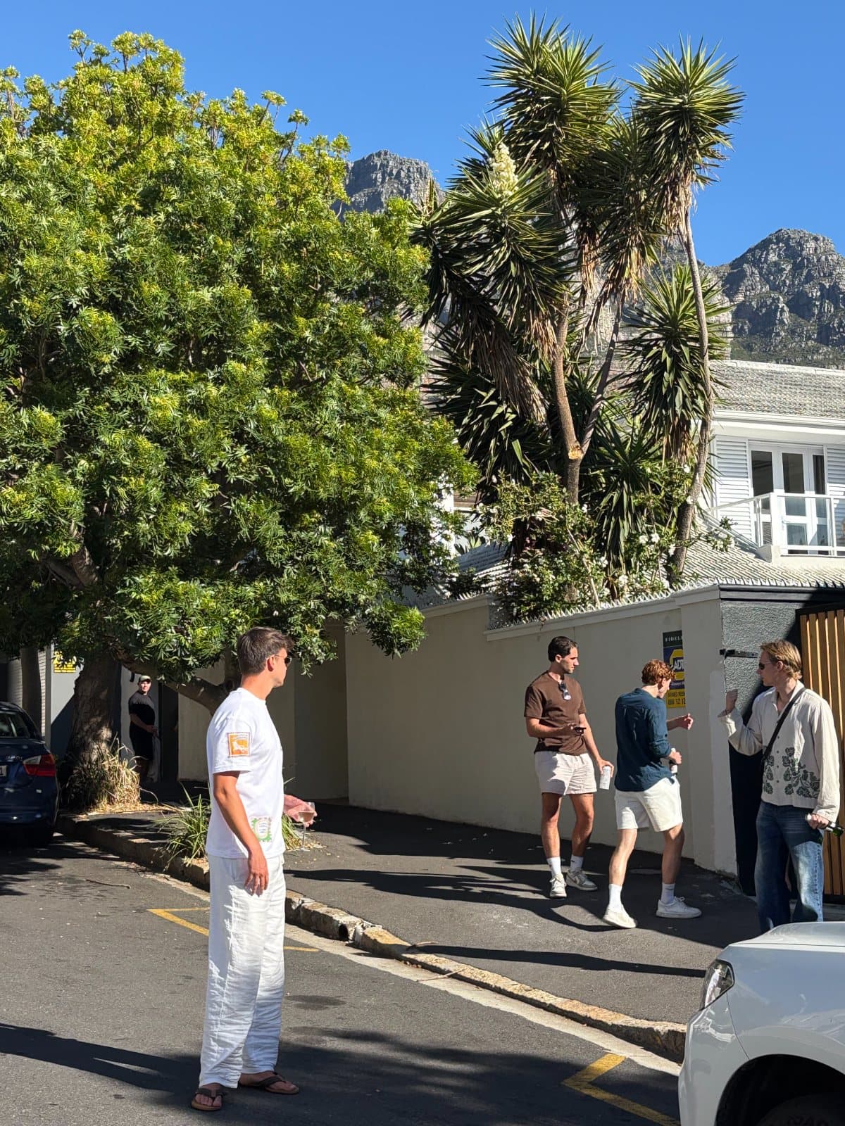 Friends on a street in Camps Bay